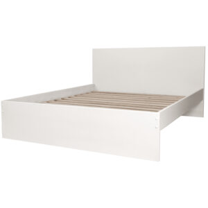 Box sänky tyynypäädyllä ja avonaisilla sivuilla. Valkoinen